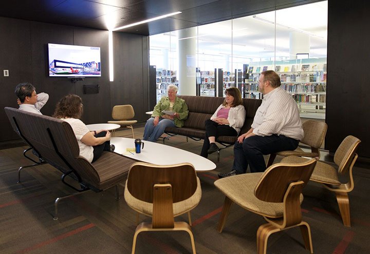 UnConference Room interior showing five people at a conference table