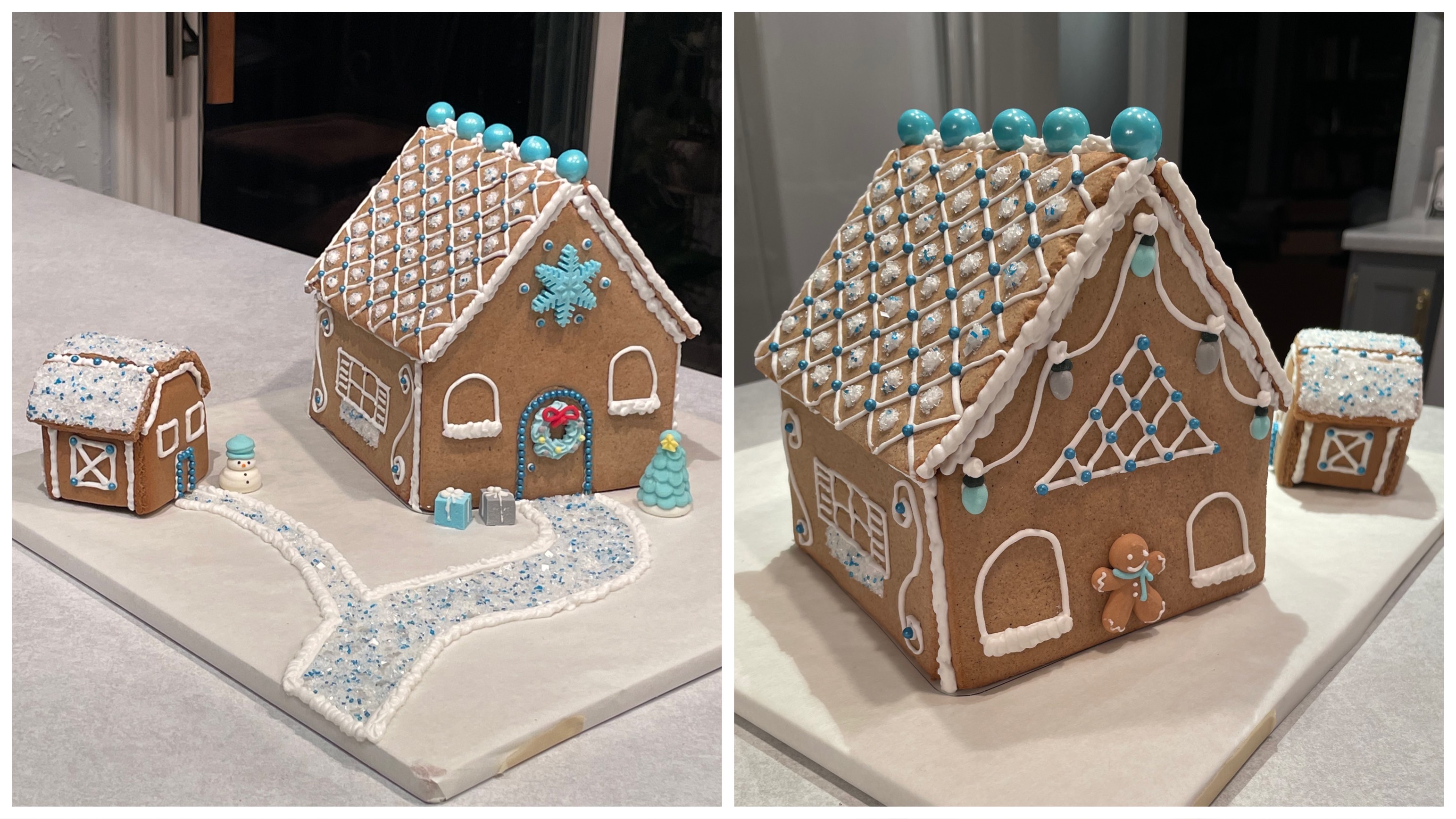A gingerbread house has white icing and blue candy on the roof.