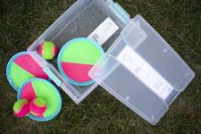 container with ball and catch kit inside