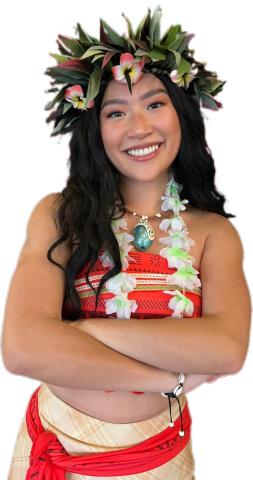 A woman dressed as a Voyager Princess smiles at the camera.
