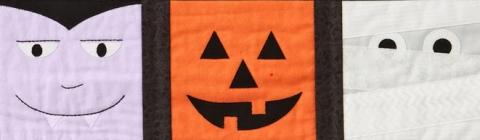 quilt blocks with dracula, jack-o-latern, and mummy
