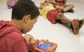 Group of children on tablets